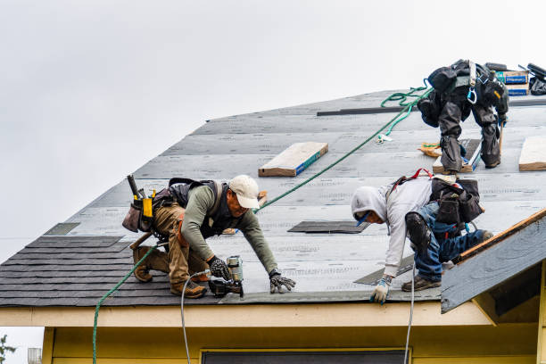 Professional Roofing technician working in Highland, CA